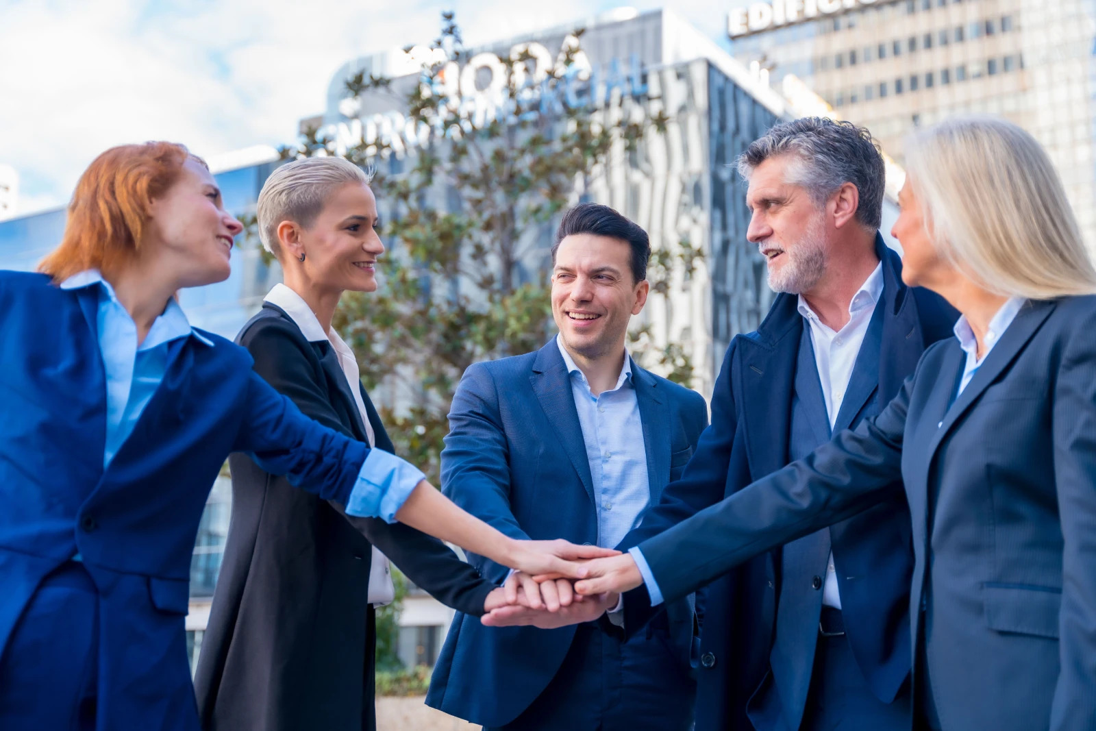 fairfield stern tokyo accomplished business people are standing in a cir img.jpg